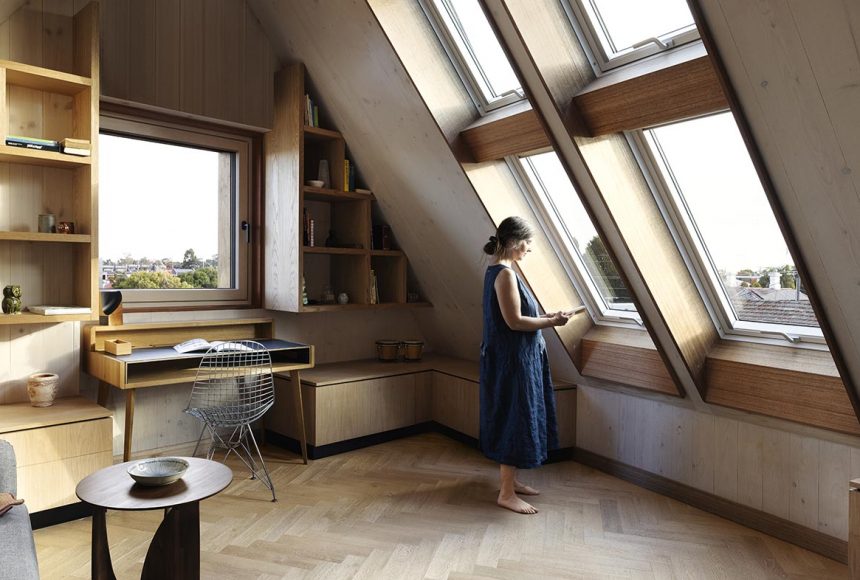 A person near the window inside their Passive House